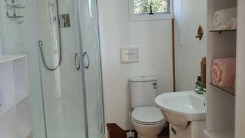 Shower, towels, soap, shampoo