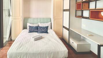 3 bedrooms, blackout drapes, iron/ironing board