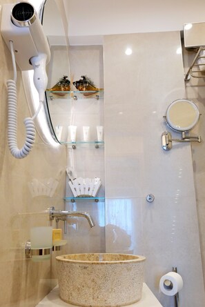 Shower, hair dryer, towels, soap