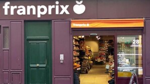 A store named 'franprix' with a green door and a visible entrance. - The cellarman  Pathéon by Mon Mon Petit Faré (Paris)