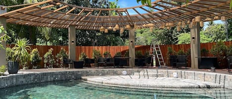 Outdoor pool, open 7:00 AM to 7:00 PM, pool loungers