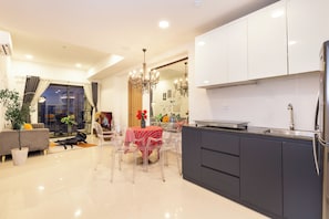 Deluxe Apartment, 3 Bedrooms, Balcony, City View | Private kitchen | Microwave, oven, stovetop, toaster - SOHO Premier Residence (Ho Chi Minh City)