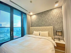 Deluxe Apartment, Balcony, City View | 1 bedroom, desk, laptop workspace, blackout drapes - OPAL TOWER Centre Point (Ho Chi Minh City)
