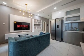 Deluxe Apartment, Balcony, City View | 1 bedroom, desk, laptop workspace, blackout drapes