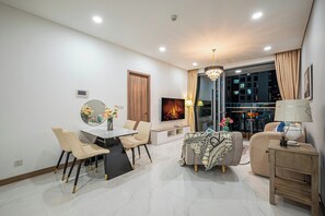 Deluxe Apartment, 2 Bedrooms, Balcony, City View | Living area | Smart TV - SUNWAH PEARL Premier Residence (Ho Chi Minh City)