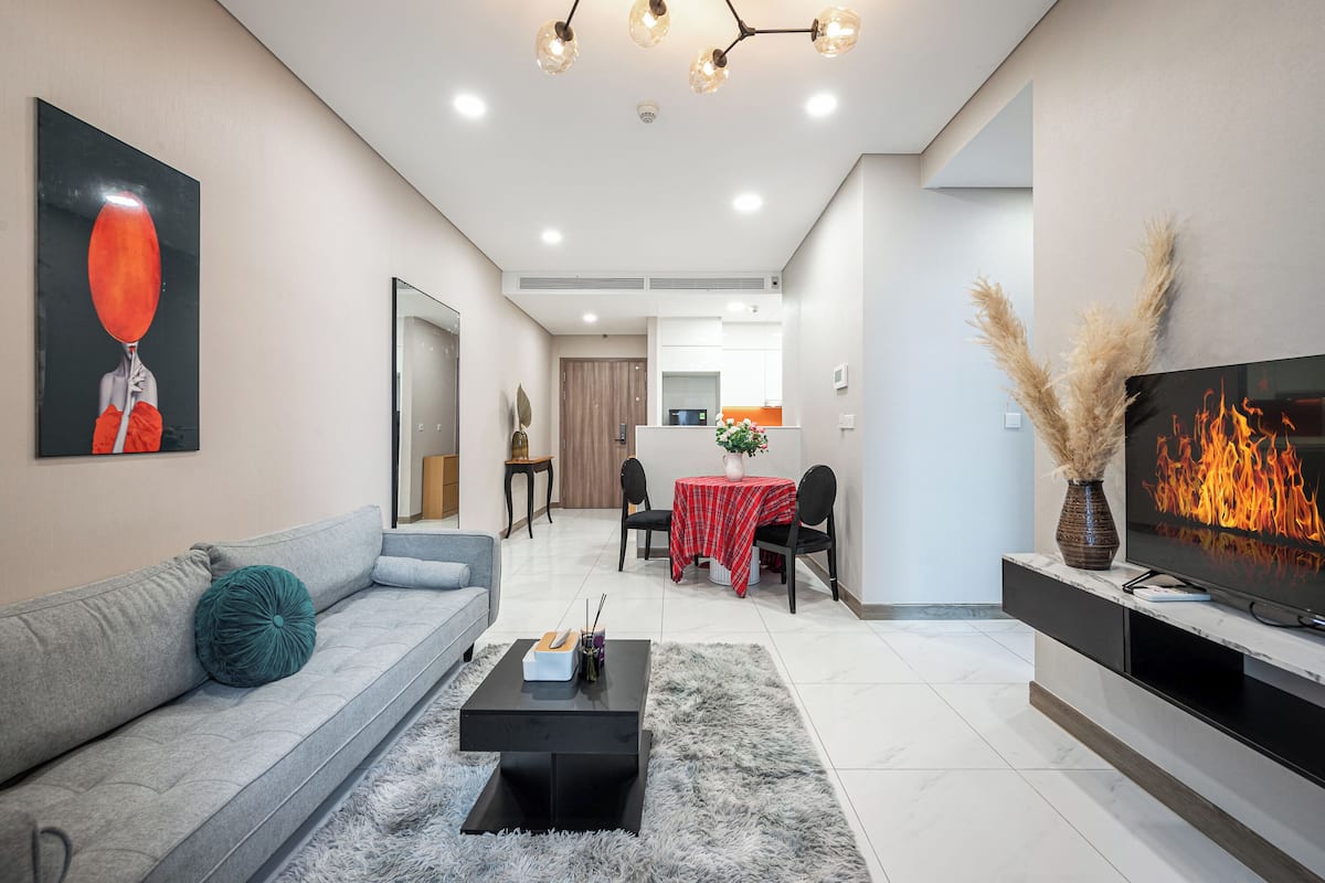 Deluxe Apartment, 1 Bedroom, Balcony, City View | Living area | Smart TV