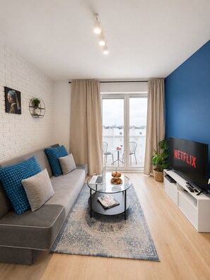 Leilighet – comfort, balkong, byutsikt | Oppholdsområde