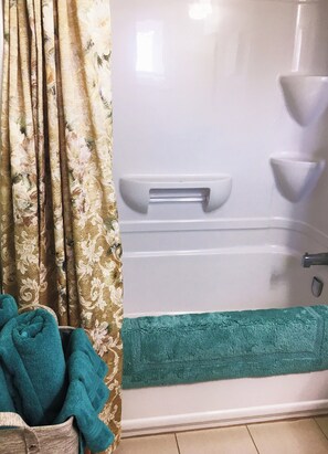 Hair dryer, towels, soap, shampoo