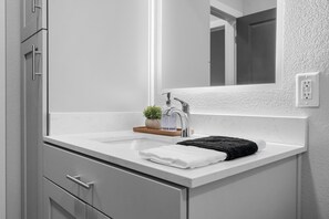 Hair dryer, towels, shampoo