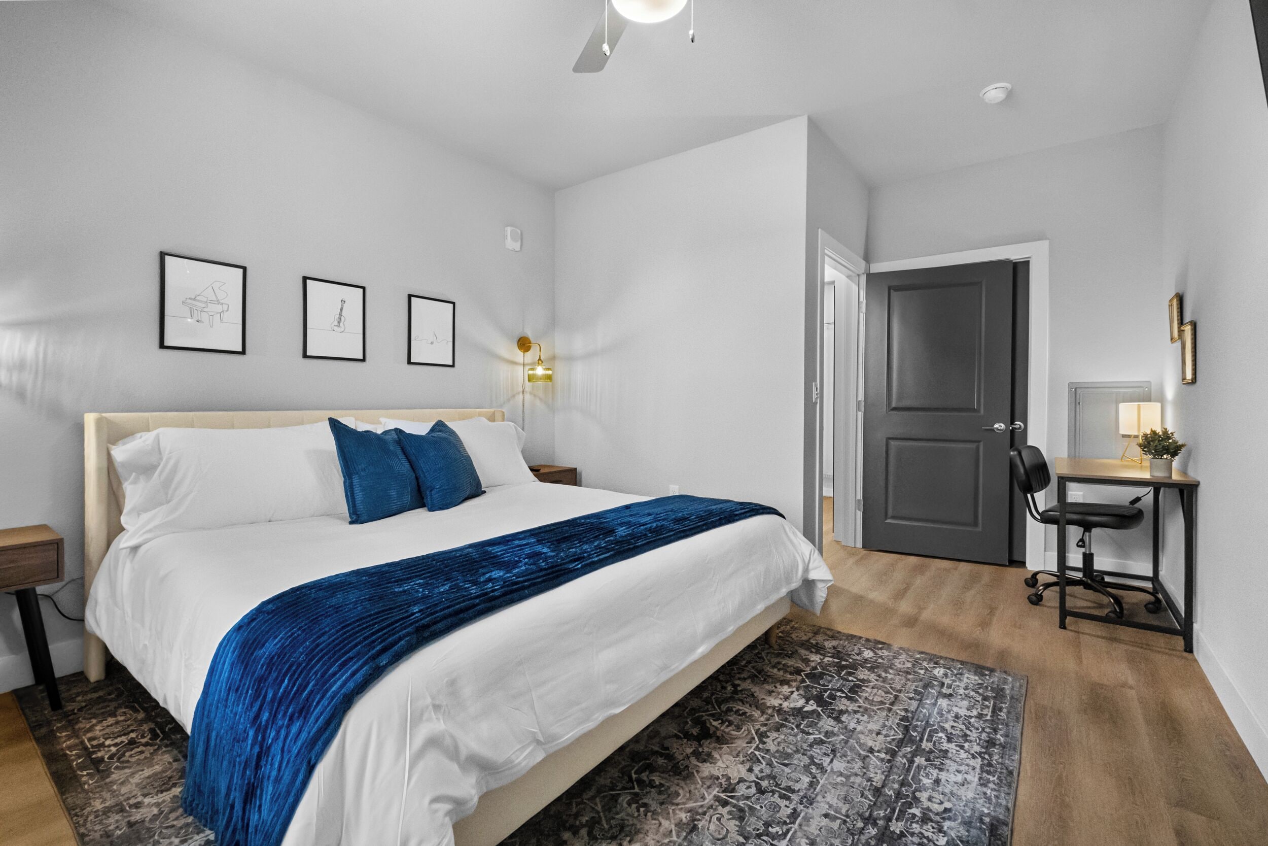 Your Master Suite, a Luxurious Haven Designed for the Ultimate Relaxation. Featuring a Plush King-Size Bed Adorned with Soft, Comfy Blankets. This Spacious Retreat Invites You to Unwind and Recharge. A Calming Ambiance for a Restful Night's Sleep. Complete with all the Glam you need for comfort!