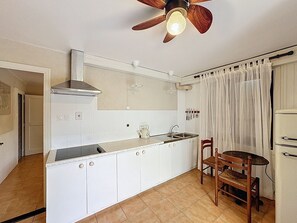 Microwave, stovetop, coffee/tea maker, toaster
