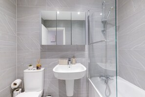 Hair dryer, towels, soap, shampoo