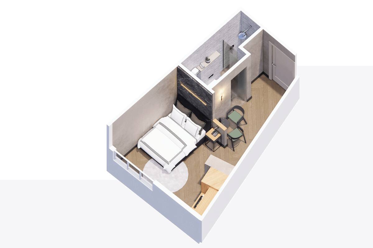 A 3D floor plan of a hotel room with a bed, bedside table, chair, and a small desk with a chair.