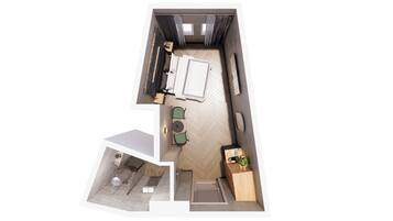 Grundriss einer 2-Zimmer-Wohnung mit Essbereich, Küche und kleinem Balkon.