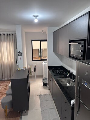 Microwave, blender, cookware/dishes/utensils