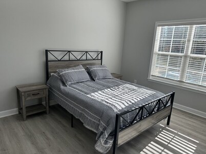 The Snowman Suite - newly constructed home with a water front view.