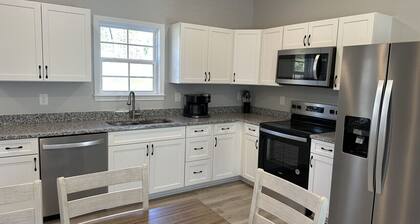 The Snowman Suite - newly constructed home with a water front view.