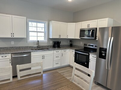 The Snowman Suite - newly constructed home with a water front view.