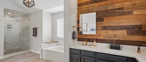 Shower, hair dryer, towels, shampoo
