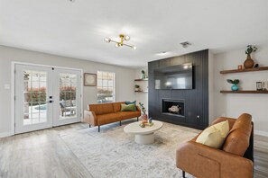 TV, fireplace, offices - 4-BD/2.5-BA Tropical Pool Oasis with a Game Room (Flower Mound)