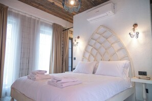 Kamar Ekonomi | Seprai premium, minibar, brankas, dan tirai kedap cahaya