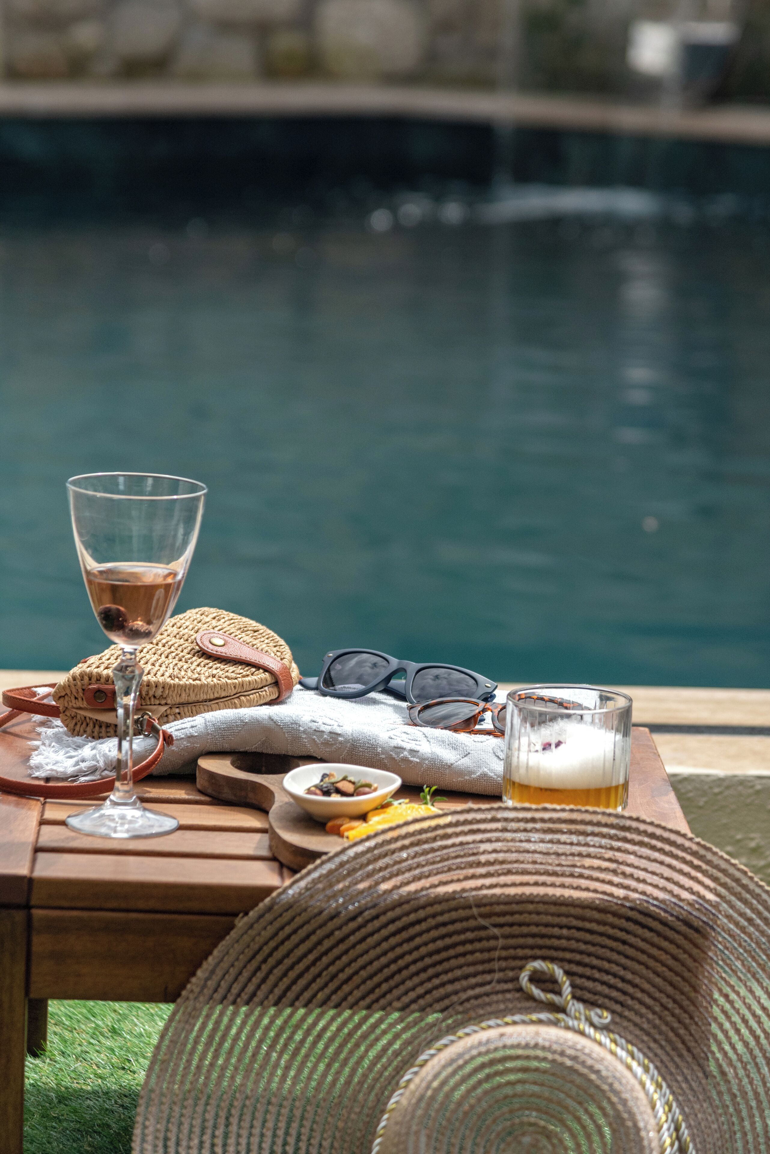 Seasonal outdoor pool, open 8:00 AM to 8:00 PM, pool loungers
