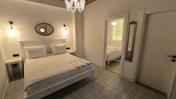 Economy suite | Luxe beddengoed, een minibar, een kluis op de kamer