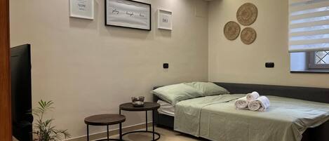 2 quartos, berço de viagem, Wi-Fi, roupa de cama