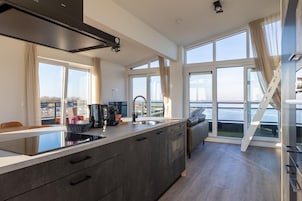 Apartamento | Cozinha privada | Cadeirão de bebê