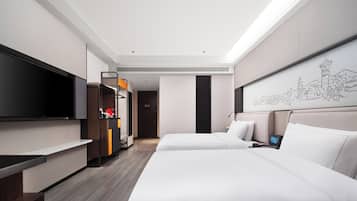 Superior Twin kamer, uitzicht op stad | Donzen dekbedden, een gratis minibar, een bureau, een laptopwerkplek