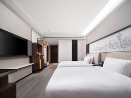 Superior Twin Room, City View | Down comforters, free minibar, desk, laptop workspace