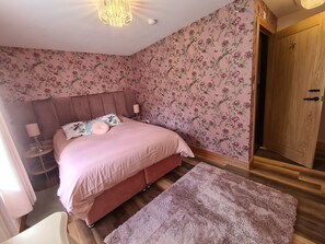 1 bedroom, desk, iron/ironing board, travel crib