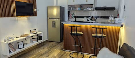 Comfort appartement | Woonruimte | Een televisie