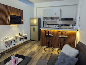 Departamento Confort | Área de sala de estar | Televisión