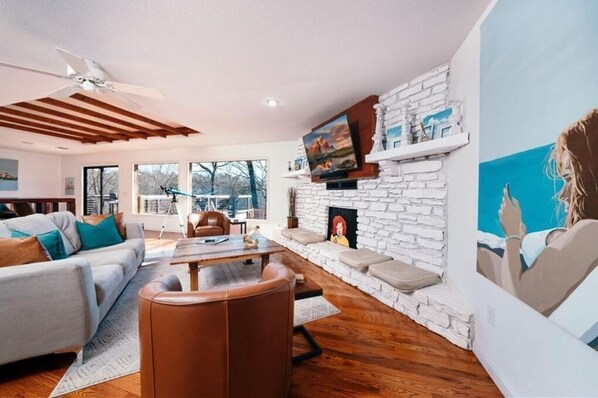 TV, fireplace, books, stereo