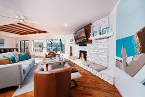 TV, fireplace, books, stereo - Winding Down at Lake Ann - Stunning Views Await! (Bella Vista)