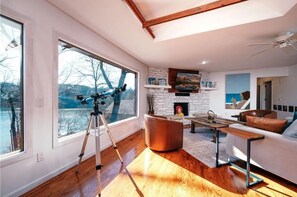 TV, fireplace, books, stereo - Winding Down at Lake Ann - Stunning Views Await! (Bella Vista)