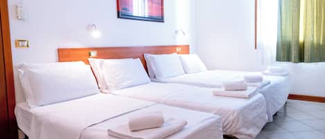 Family Quadruple Room, Non Smoking | Desk, laptop workspace, free WiFi
