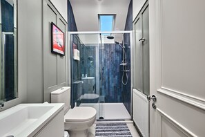 Hair dryer, towels, soap, shampoo