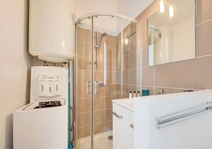 Hair dryer, towels, soap, shampoo