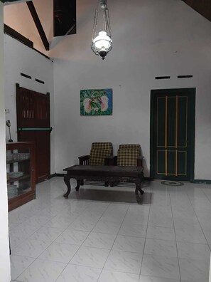 غرفة سوبيريور - سرير كبير | منطقة المعيشة