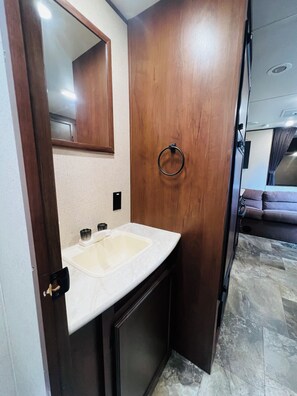 Interior - Cozy RV in enjoyable Orlando with AC, WiFi (Orlando)