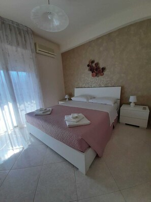 2 dormitorios, cuna de viaje, wifi y ropa de cama