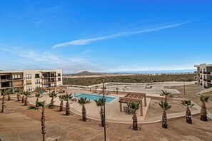 A heated pool - OCEANVIEW 2 BR condo with AC, WiFi in enchanting Diamante area Cabo San Lucas! (Cabo San Lucas)