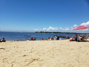 On the beach, sun-loungers