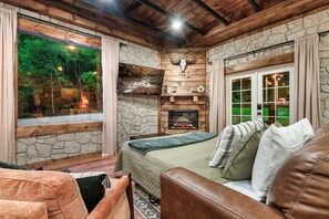 1 bedroom, desk, iron/ironing board, travel crib