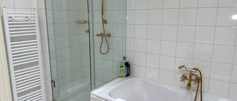 Shower, hair dryer, towels, soap