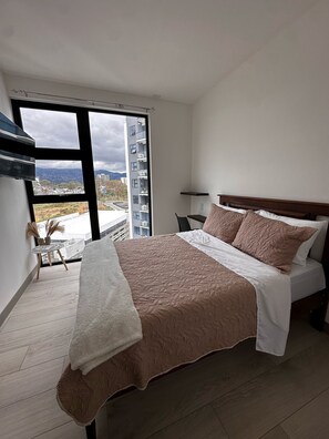 1 slaapkamer, een strijkplank/strijkijzer, wifi