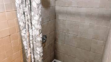 Shower, towels, toilet paper