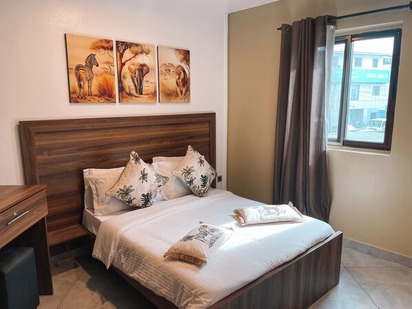 1 chambre, fer et planche à repasser, draps fournis